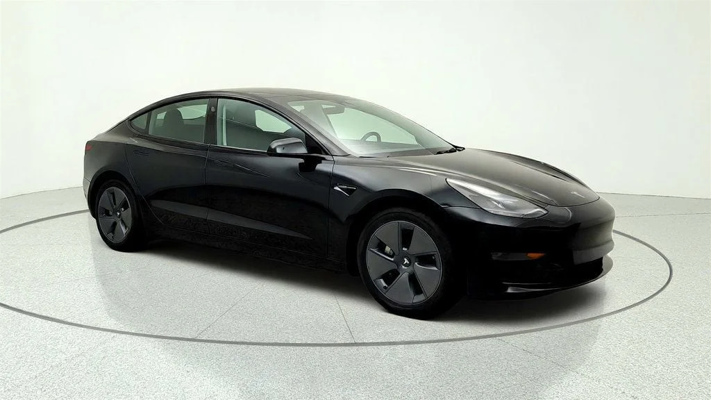 Used 2023 Solid Black Tesla RWD image 3