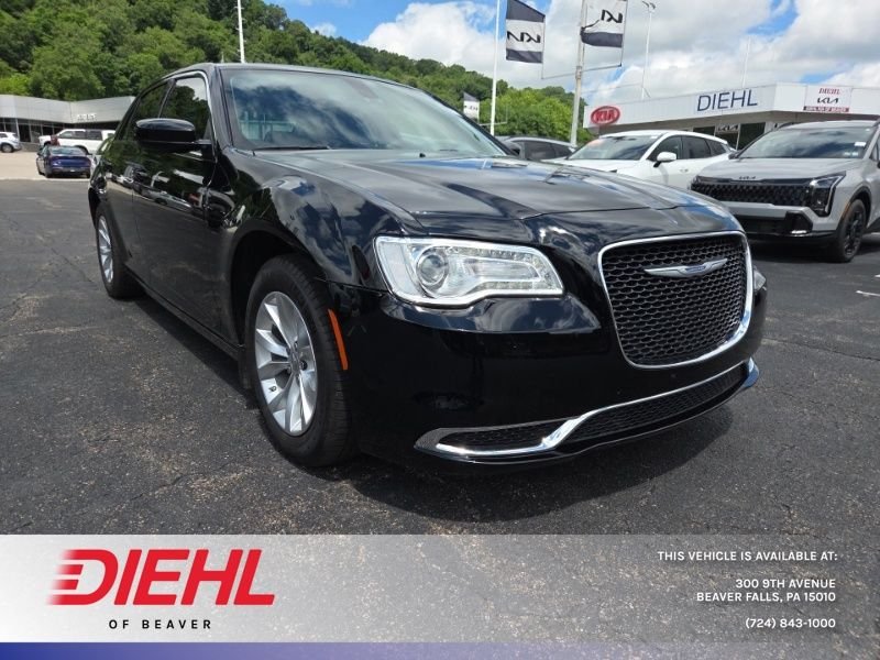 Used 2022 Black Chrysler Touring image 1