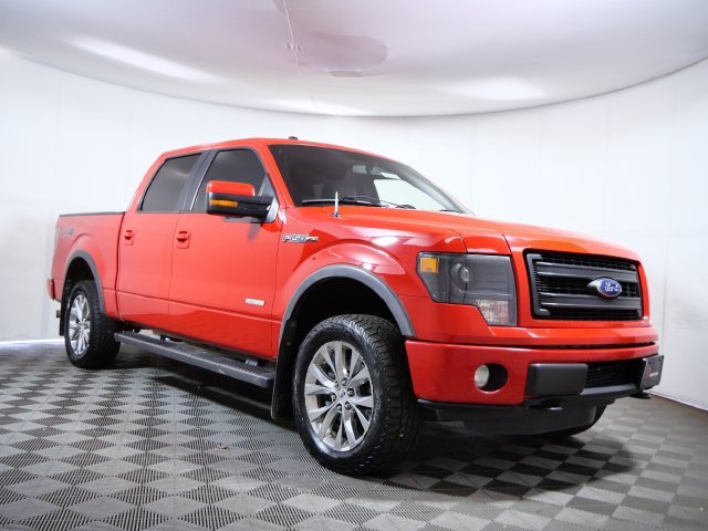Used 2013 Red Ford FX4 image 1