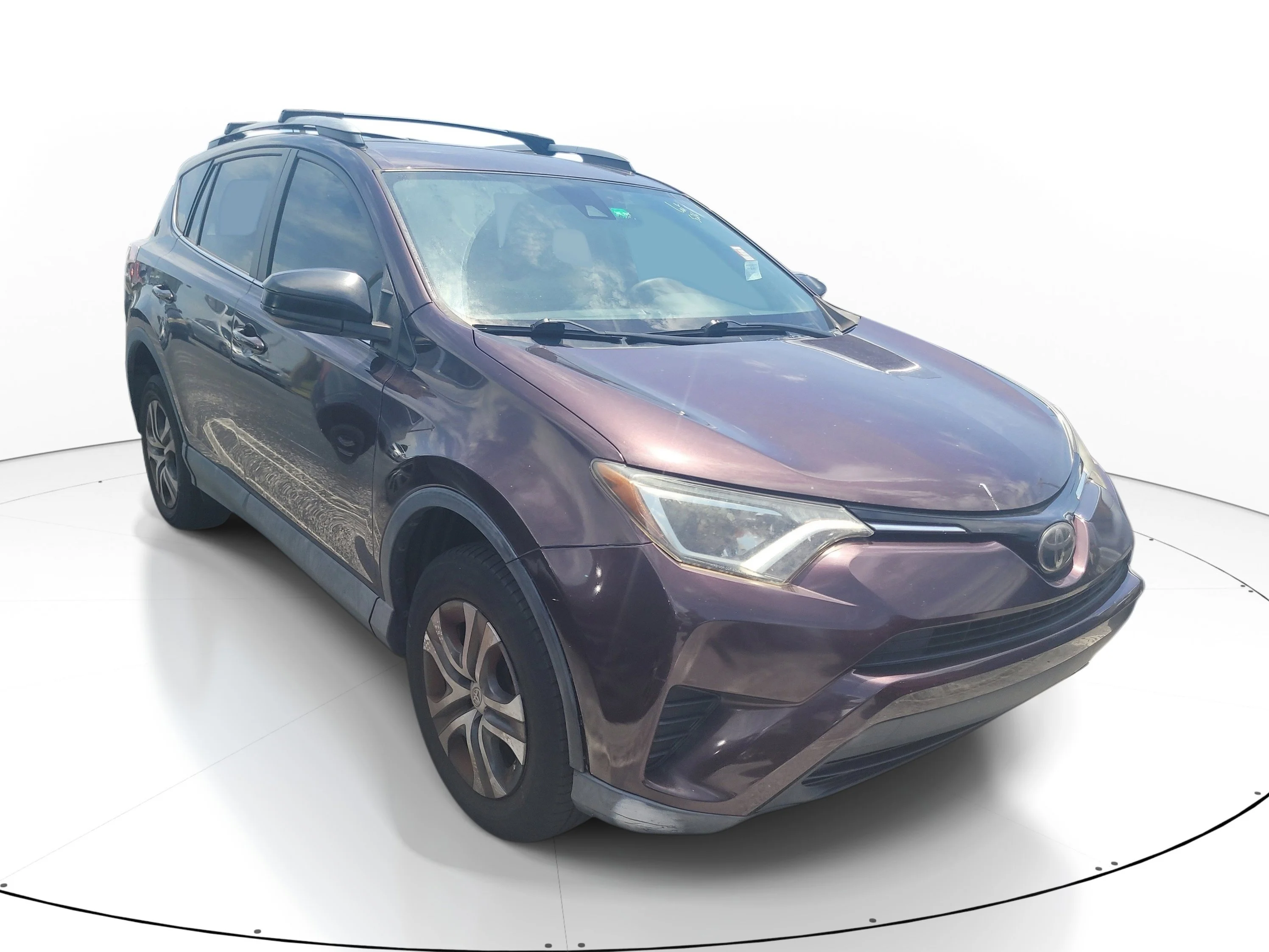 Used 2017 Black Currant Toyota LE image 1