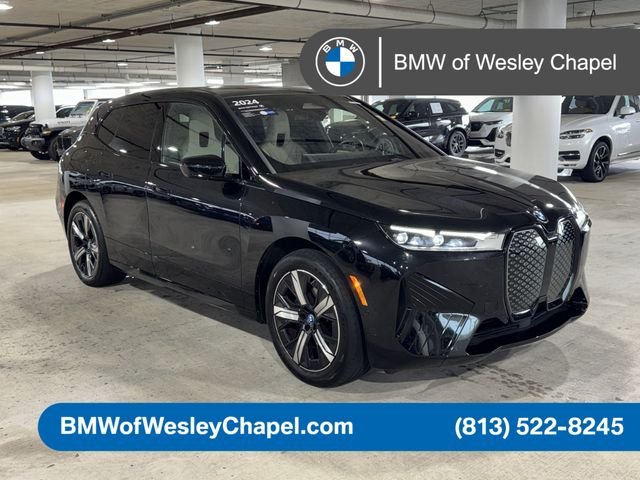 Certified Used 2024 Black Sapphire Metallic BMW xDrive50 image 1