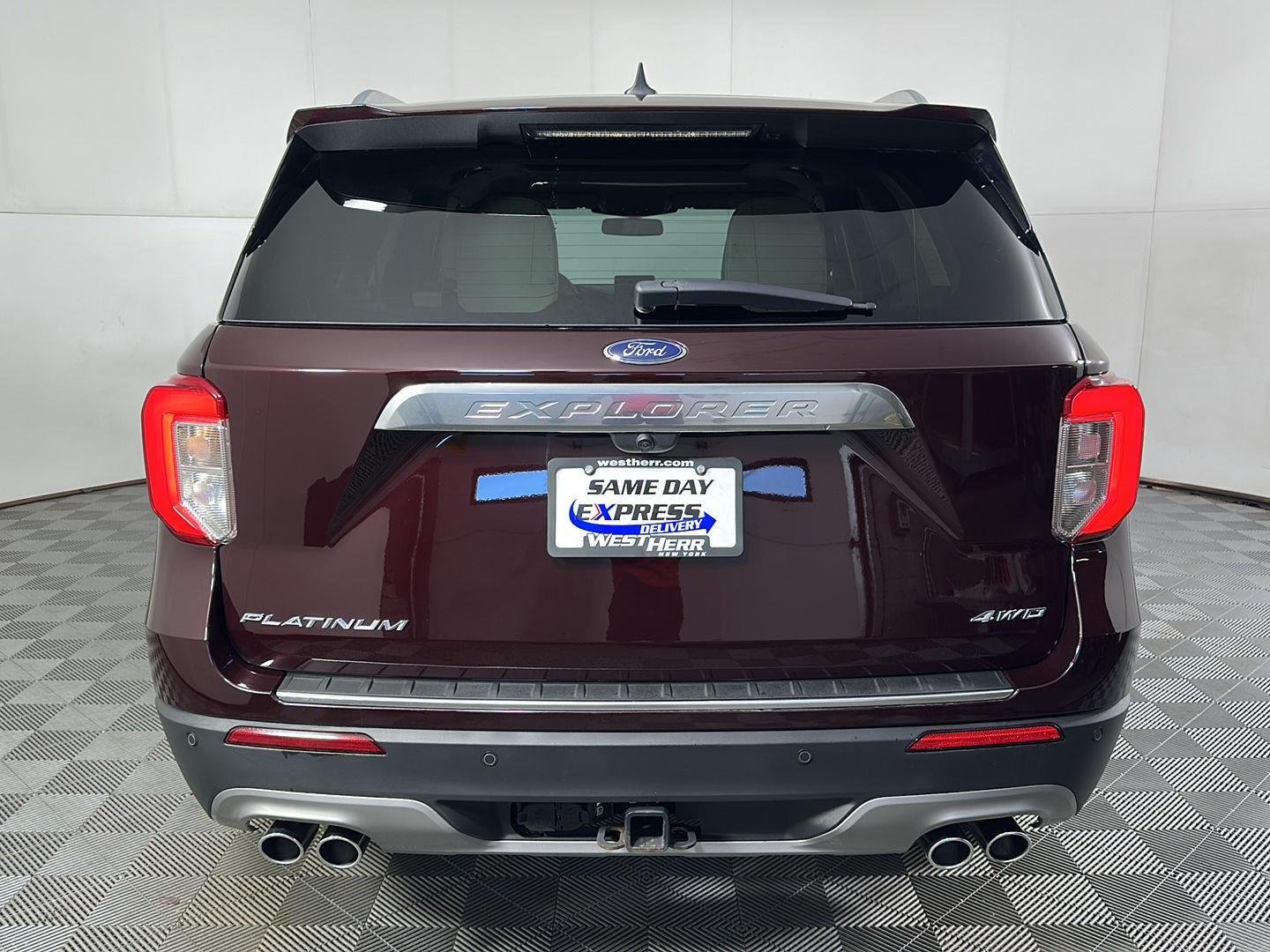 Used 2023 Jewel Red Metallic Tinted Clearcoat Ford Platinum image 6
