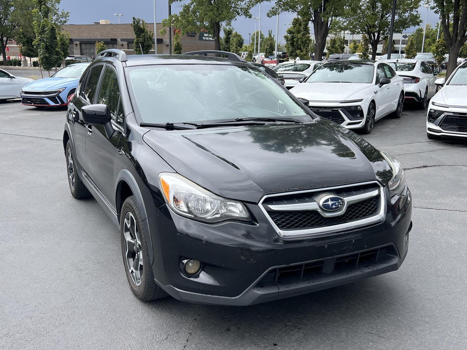 Used 2015 Crystal Black Silica Subaru Premium image 4