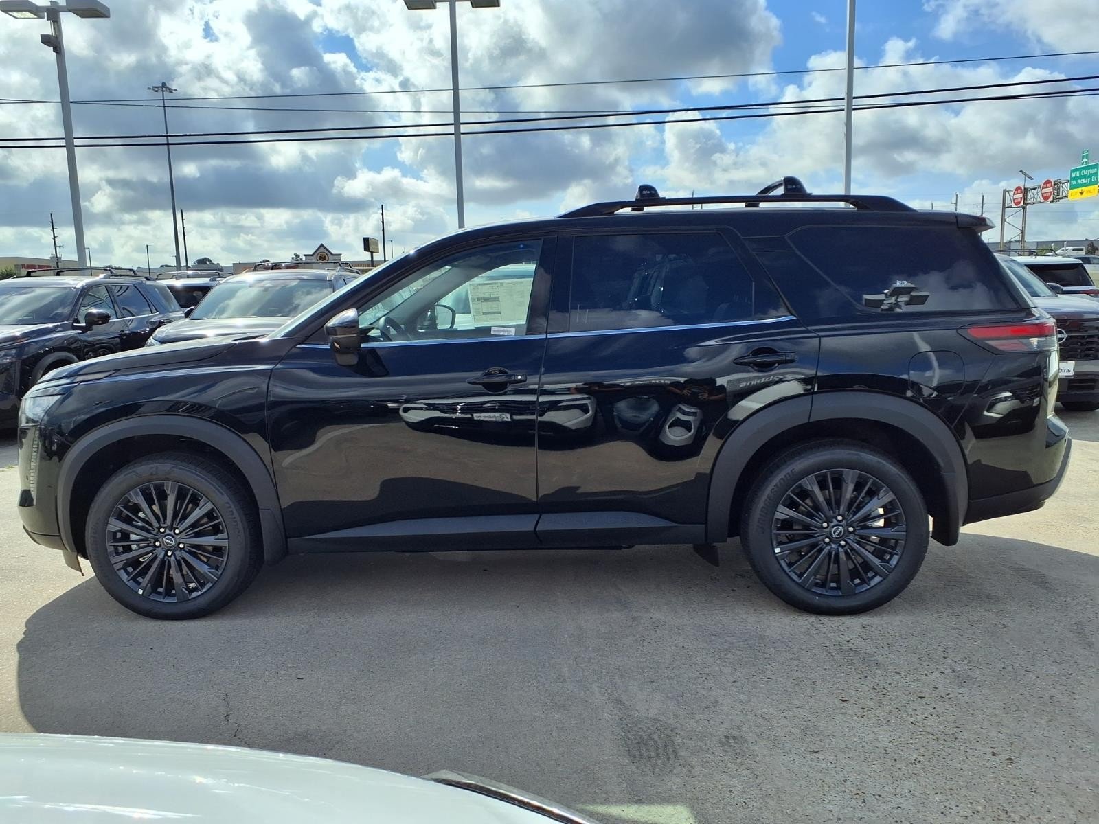New 2026 Super Black Nissan SL image 8
