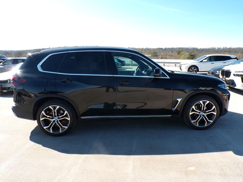 Certified Used 2026 Black Sapphire Metallic BMW xDrive40i image 7