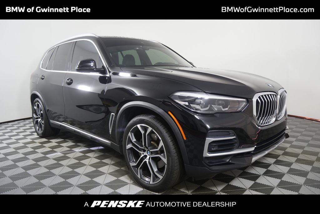Used 2023 Jet Black BMW sDrive40i image 1