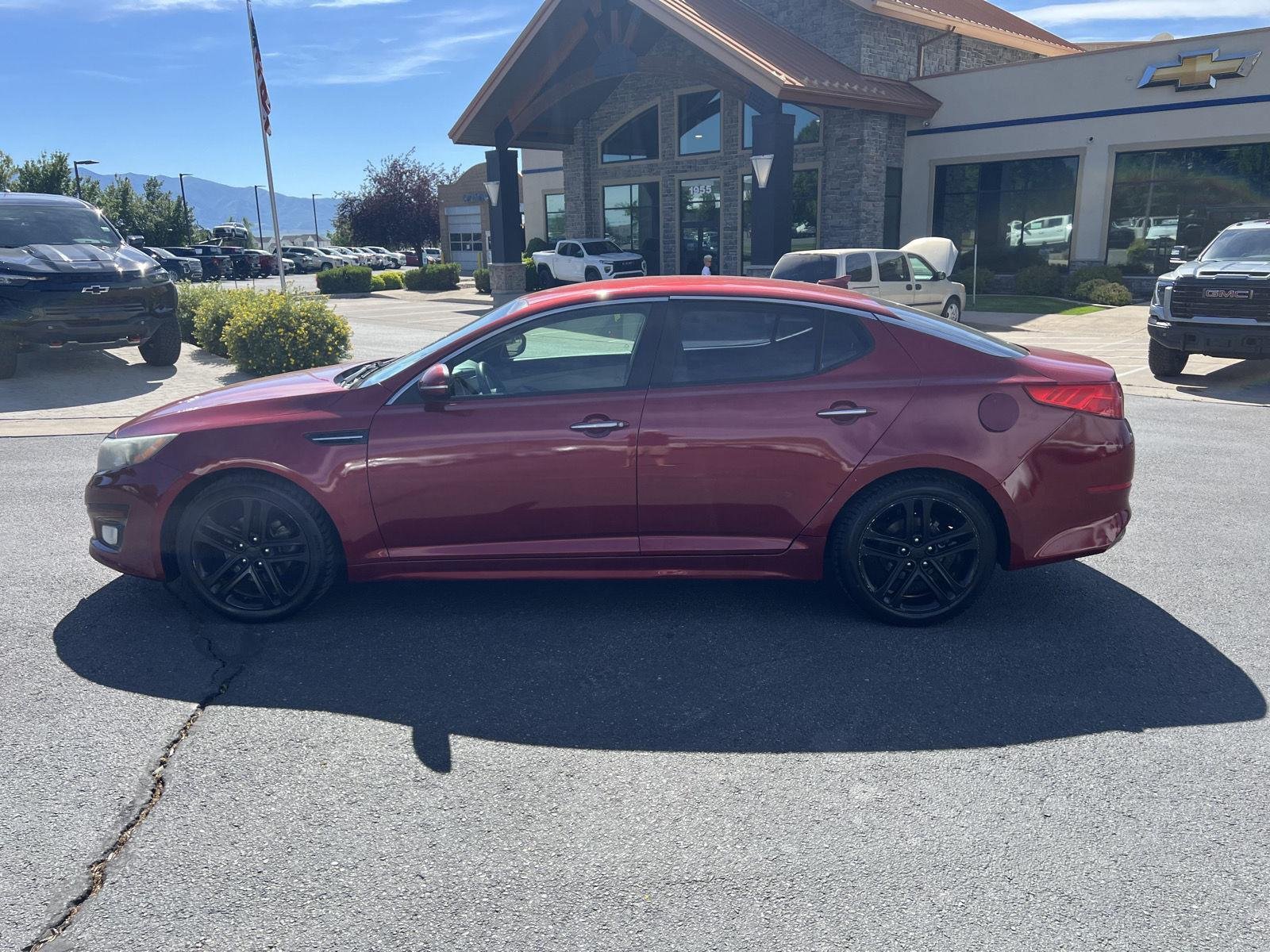 Used 2015 Kia Optima LX with VIN 5XXGM4A73FG352471 for sale in Logan, UT
