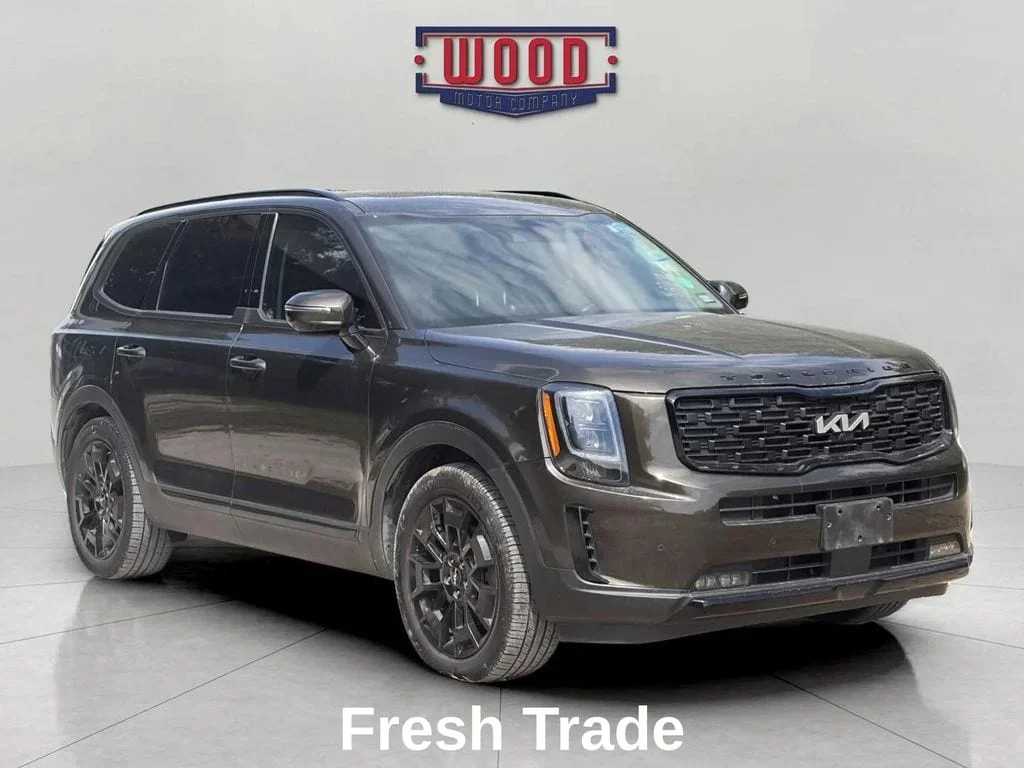 Used 2022 Dark Moss Kia SX image 1