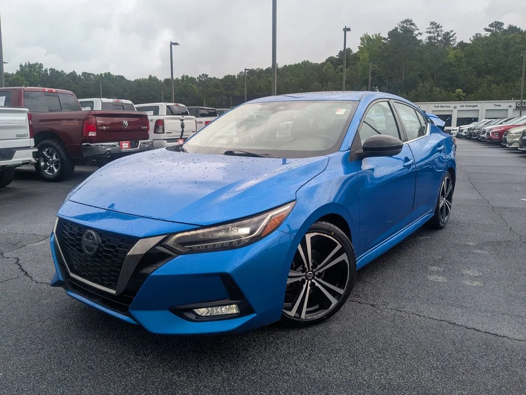 Used 2021 Electric Blue Metallic Nissan SR image 1