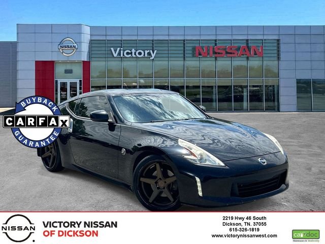 Used 2017 Black Nissan Touring image 1