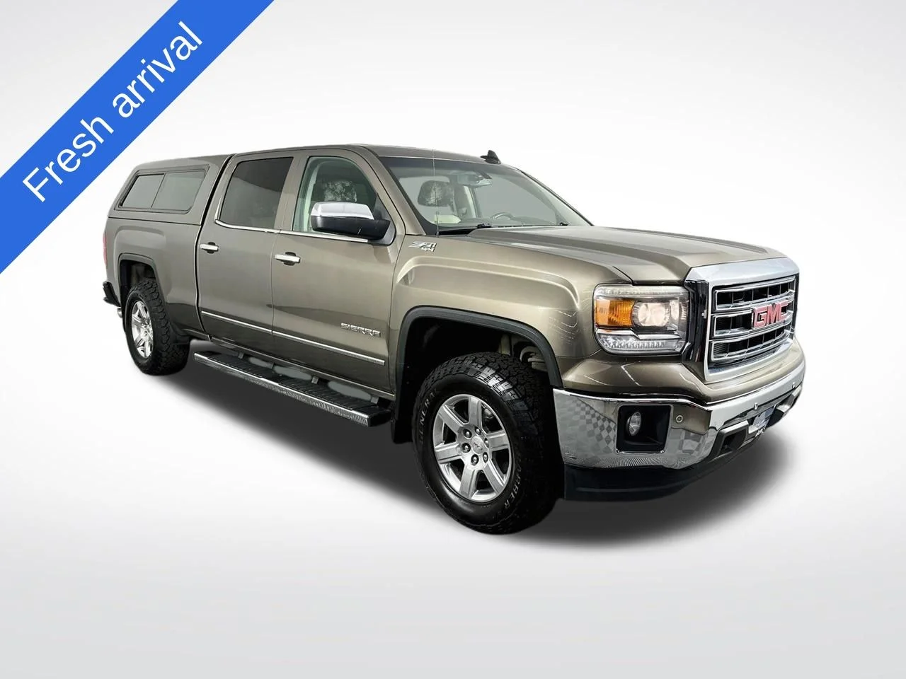 Used 2015 Bronze Alloy Metallic GMC SLT image 1