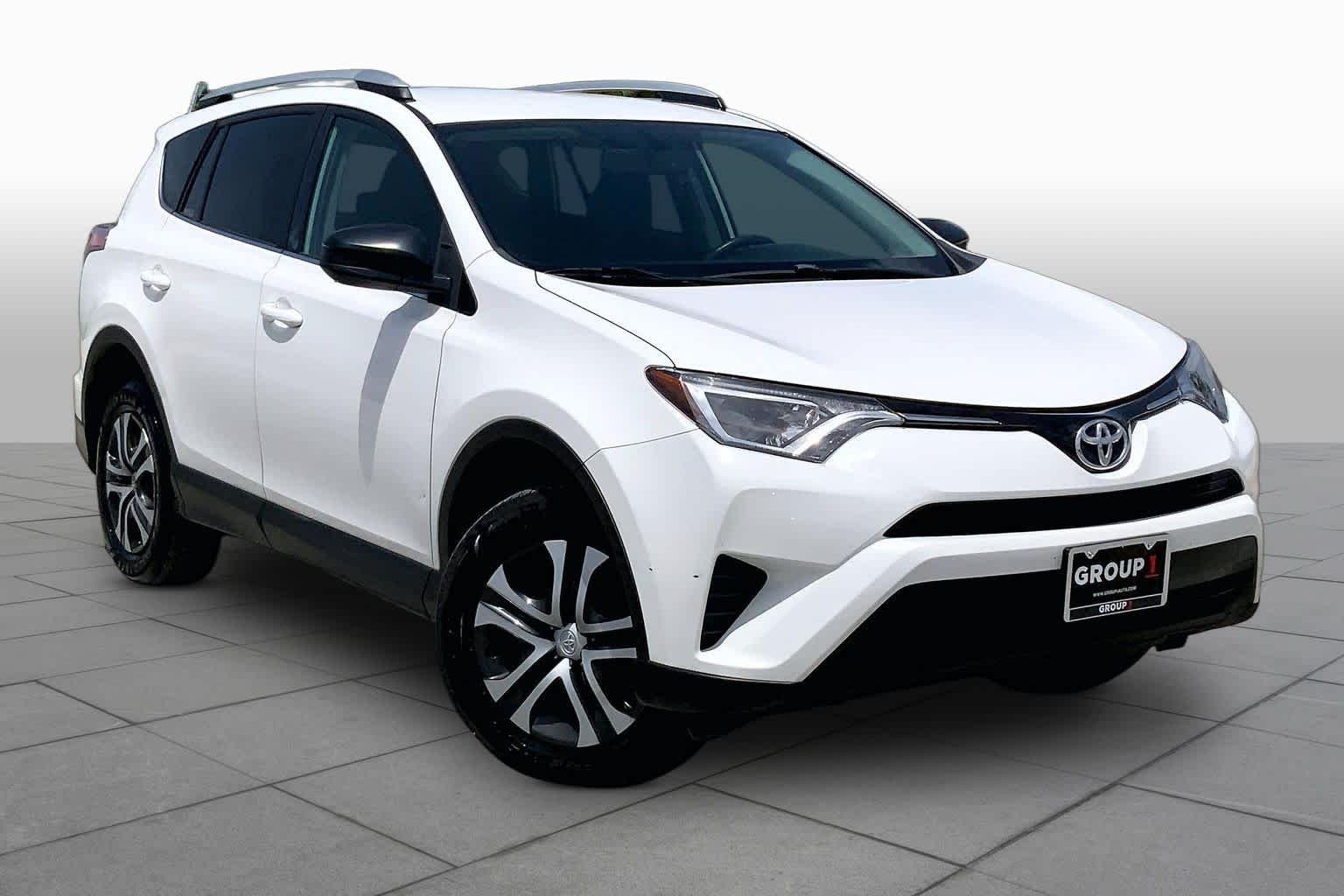 Used 2016 Super White Toyota LE image 3