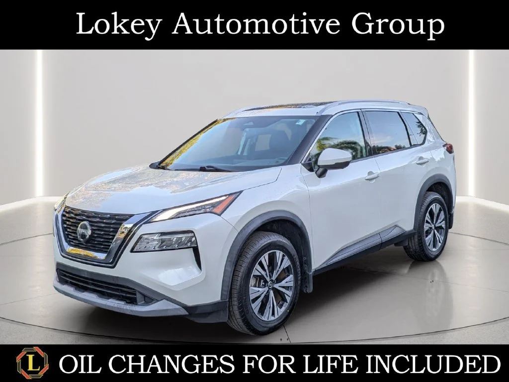 Used 2021 White Nissan SV image 1