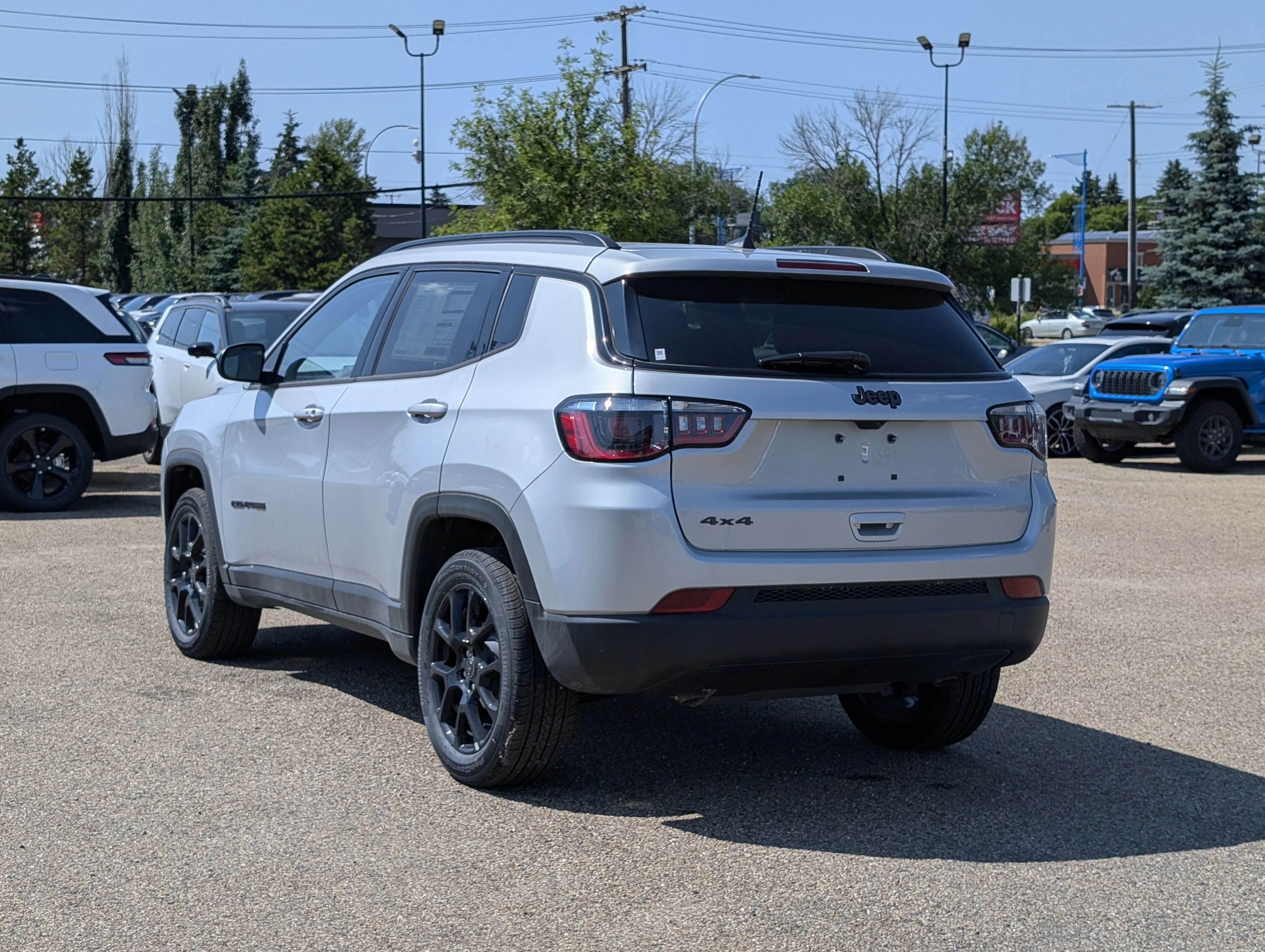 New 2026 Silver Zynith Metallic Jeep North image 4