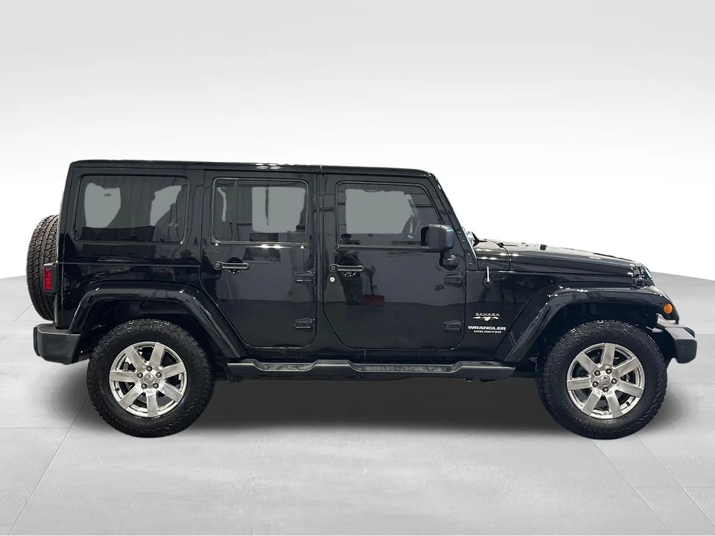 Used 2016 Black Jeep Unlimited Sahara image 8