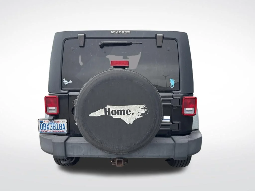 Used 2012 Black Jeep Unlimited Sport image 14