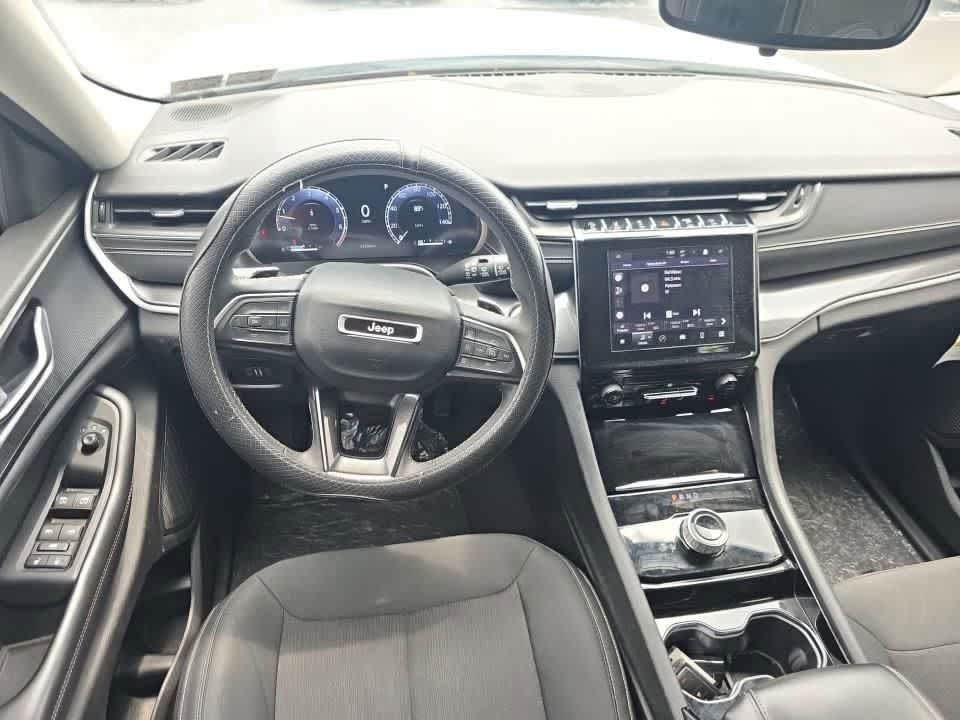 Used 2023 Bright White Clearcoat Jeep Laredo image 4
