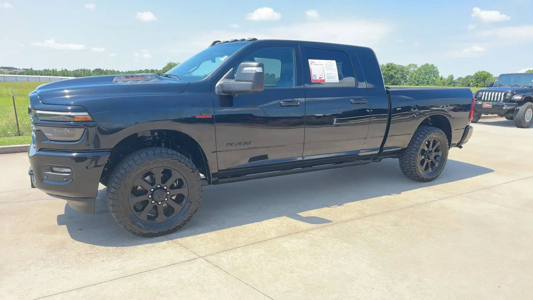 Used 2025 Diamond Black Crystal Pearlcoat Ram Laramie image 3