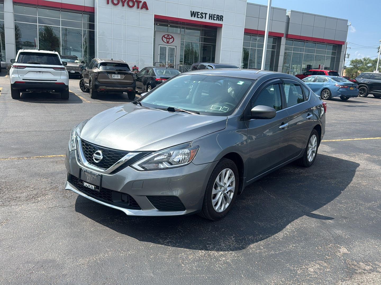 Used 2019 Gun Metallic Nissan SV image 3