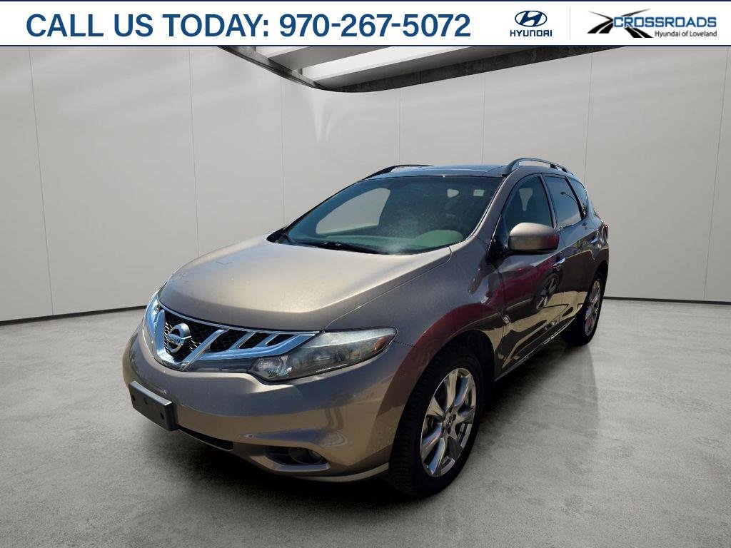 Used 2014 Tinted Bronze Metallic Nissan LE image 1