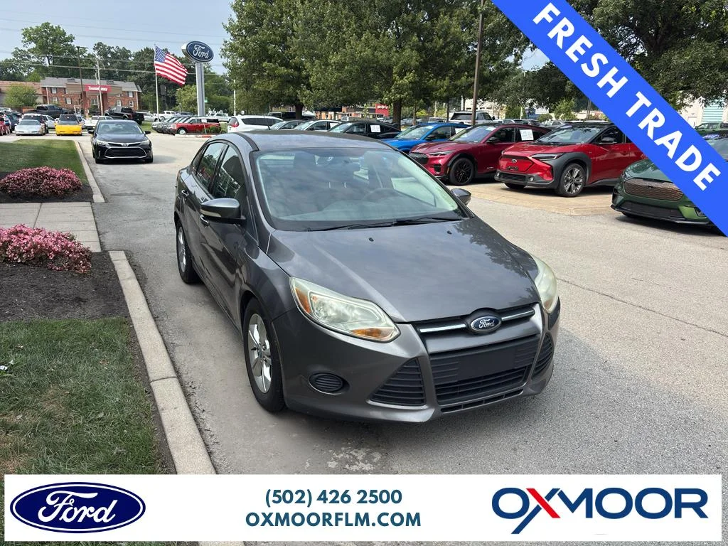 Used 2013 Sterling Gray Metallic Ford SE image 1