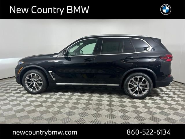 New 2026 Black Sapphire Metallic BMW xDrive40i image 4