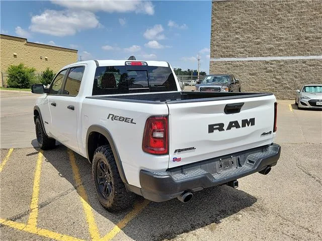 Used 2025 Bright White Clearcoat RAM Rebel 4x4 Crew Cab 144.5 in. WB image 3
