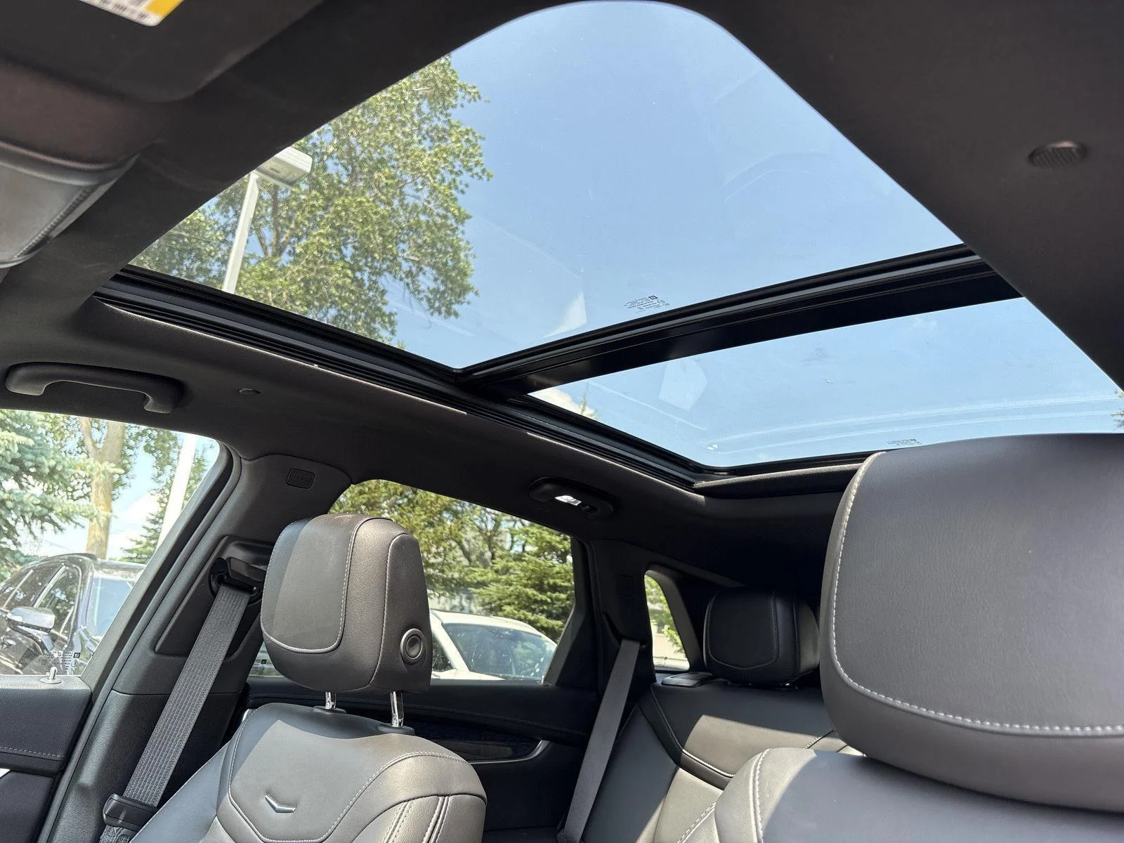 Used 2024 Argent Silver Metallic Cadillac AWD Premium Luxury image 9