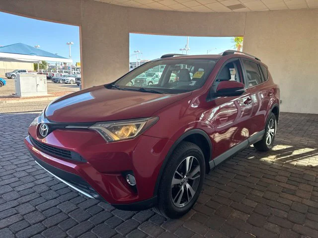Used 2016 Barcelona Red Metallic Toyota XLE image 1