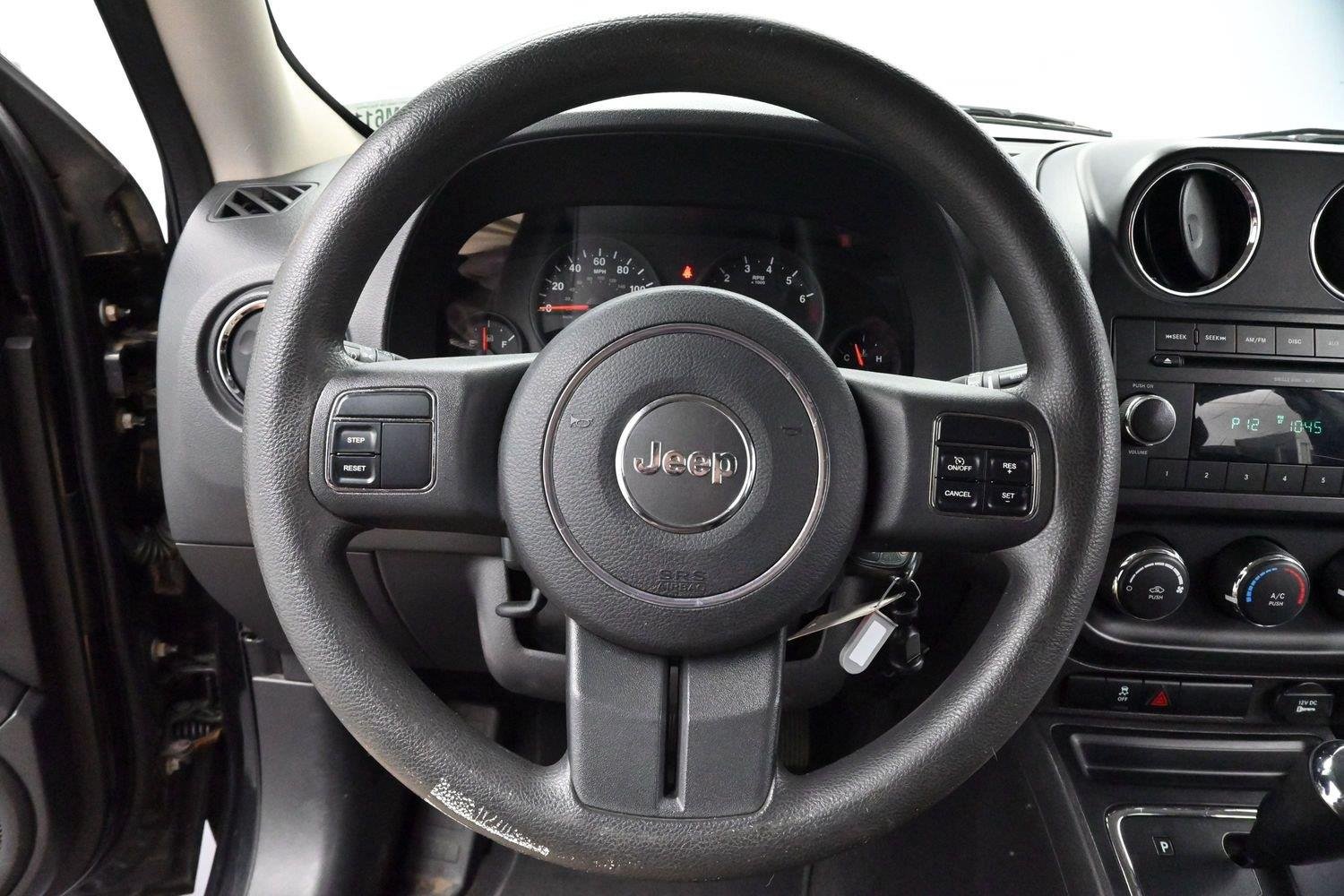 Used 2011 Brilliant Black Crystal Pearl Jeep Sport image 14