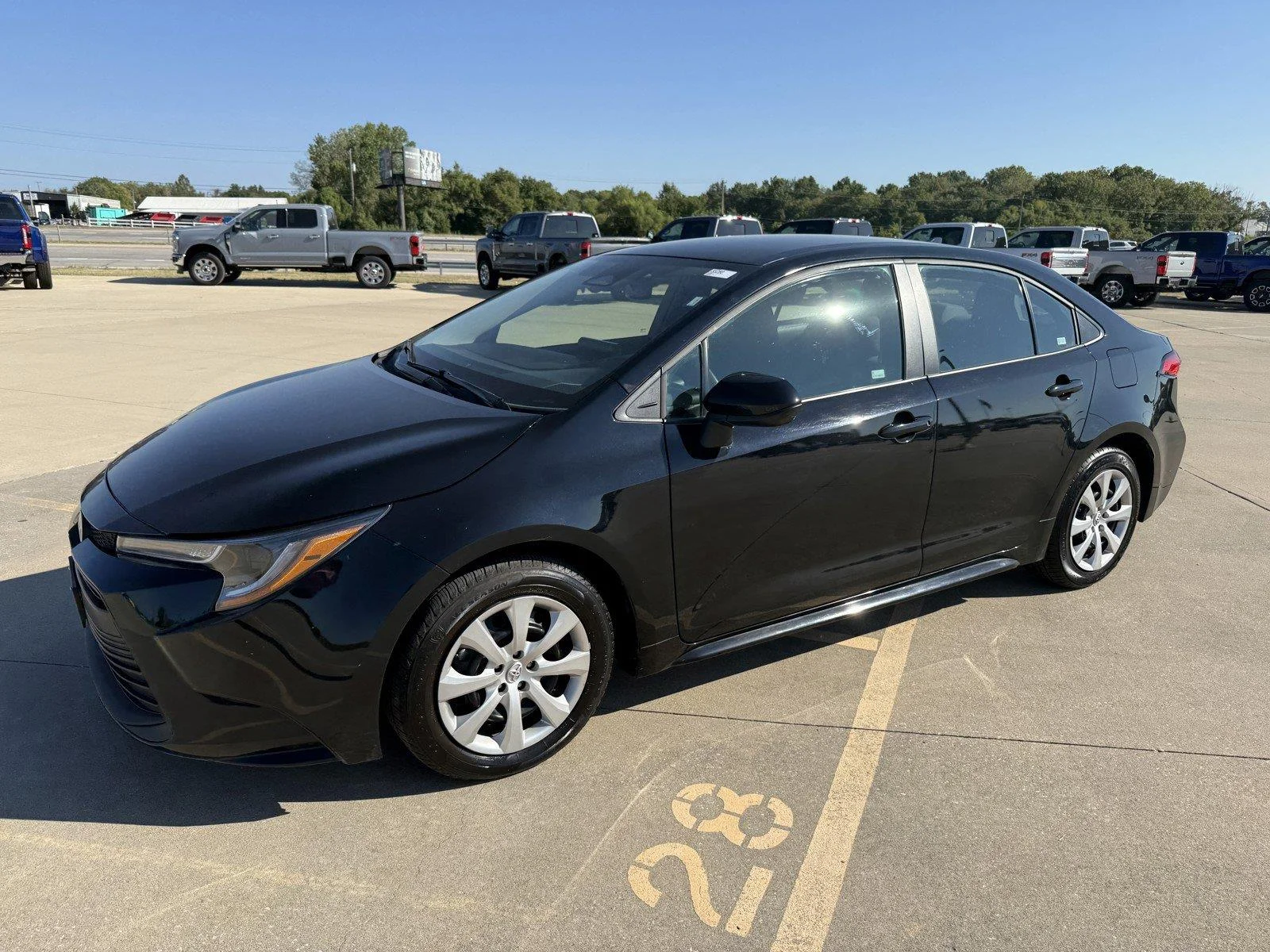 Certified Used 2025 Midnight Black Metallic Toyota LE image 4