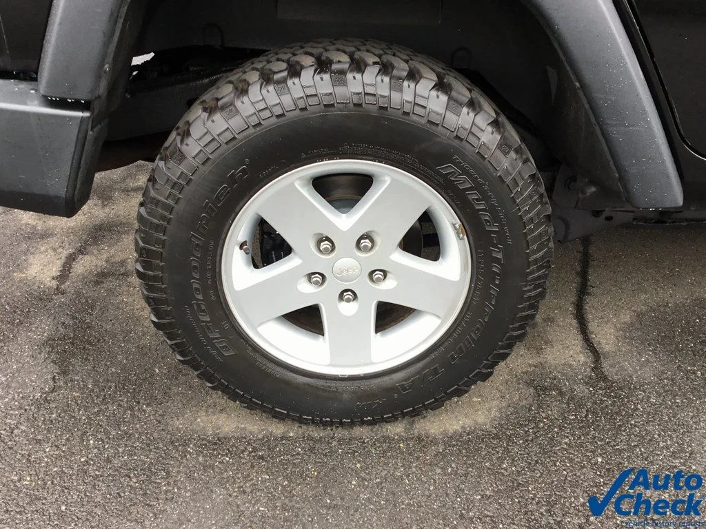 Used 2010 Black Jeep Unlimited Sport image 26
