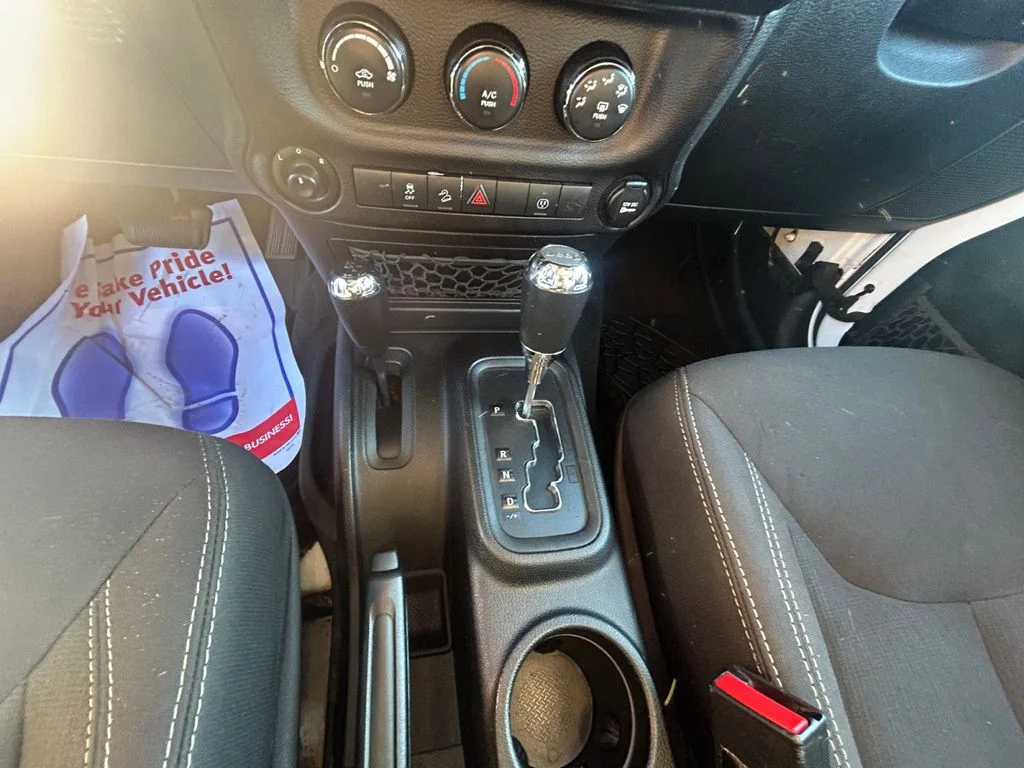 Used 2018 Bright White Jeep Unlimited Sahara 4x4 image 12