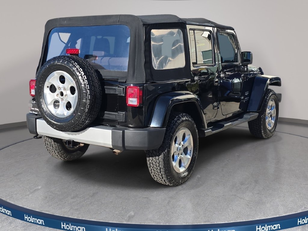 Used 2015 Black Jeep Unlimited Sahara image 6