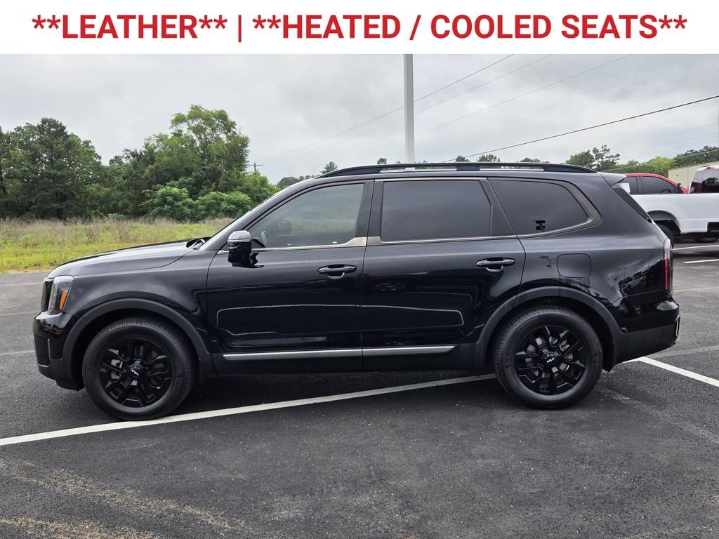 Used 2023 Ebony Black Kia SX-Prestige X-Pro image 5