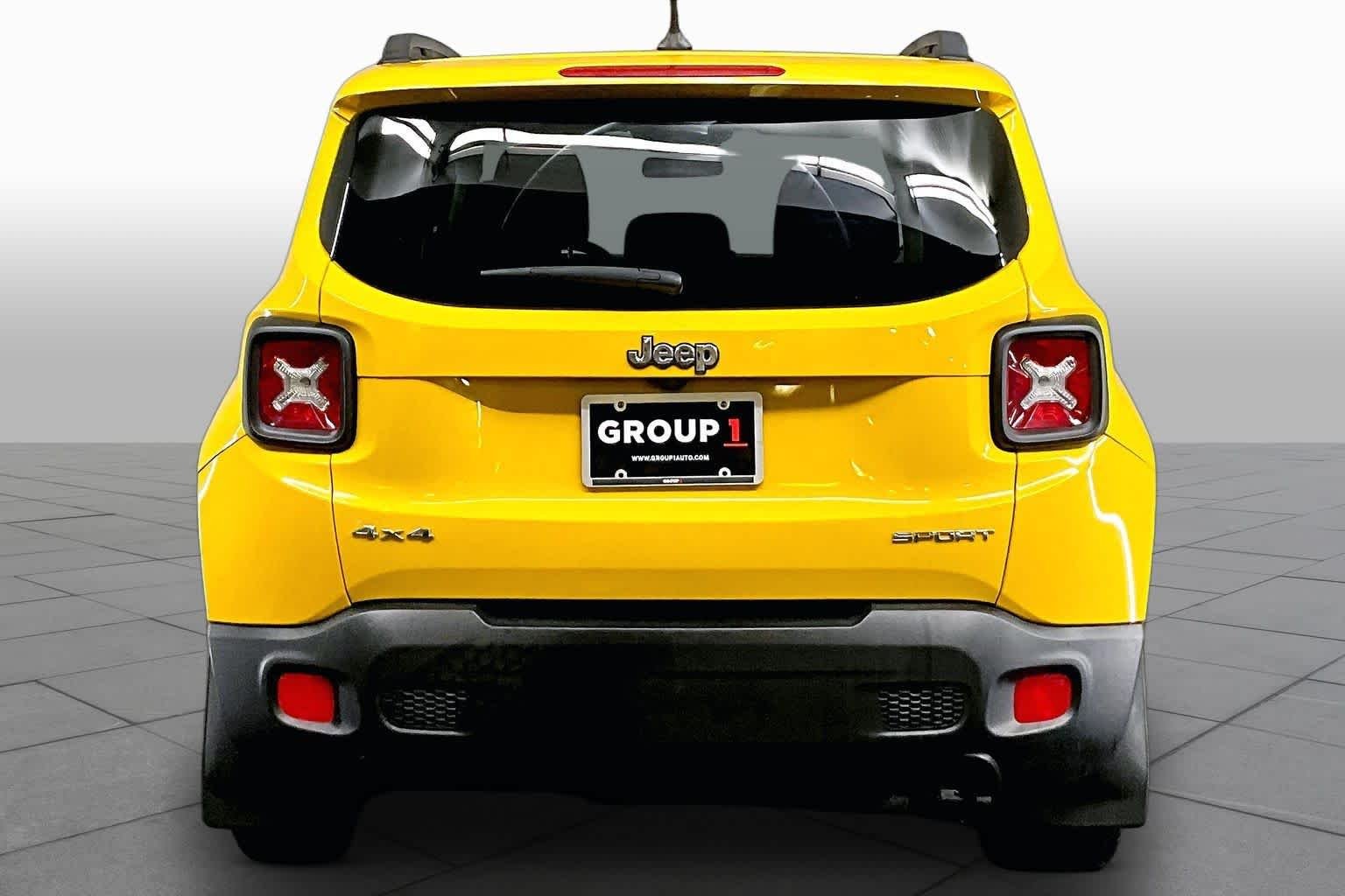 Used 2017 Solar Yellow Jeep Sport image 5