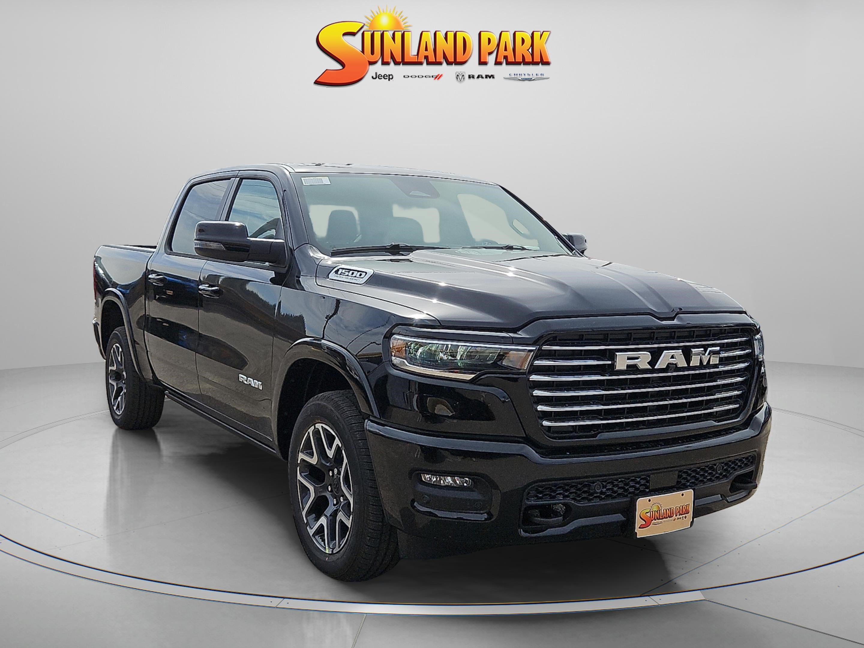 New 2026 Diamond Black Crystal Pearl-Coat Exterior Paint RAM Laramie image 1