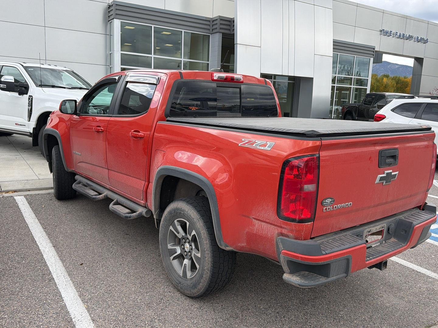 Used 2016 Inferno Orange Metallic Chevrolet 4WD Z71 image 4