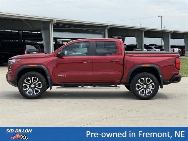 Used 2024 Volcanic Red Tintcoat GMC 4WD AT4 image 8