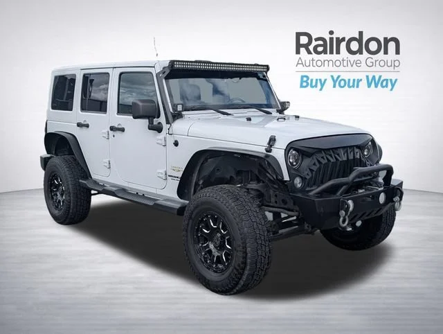 Used 2014 Bright White Clearcoat Jeep Unlimited Sahara image 1