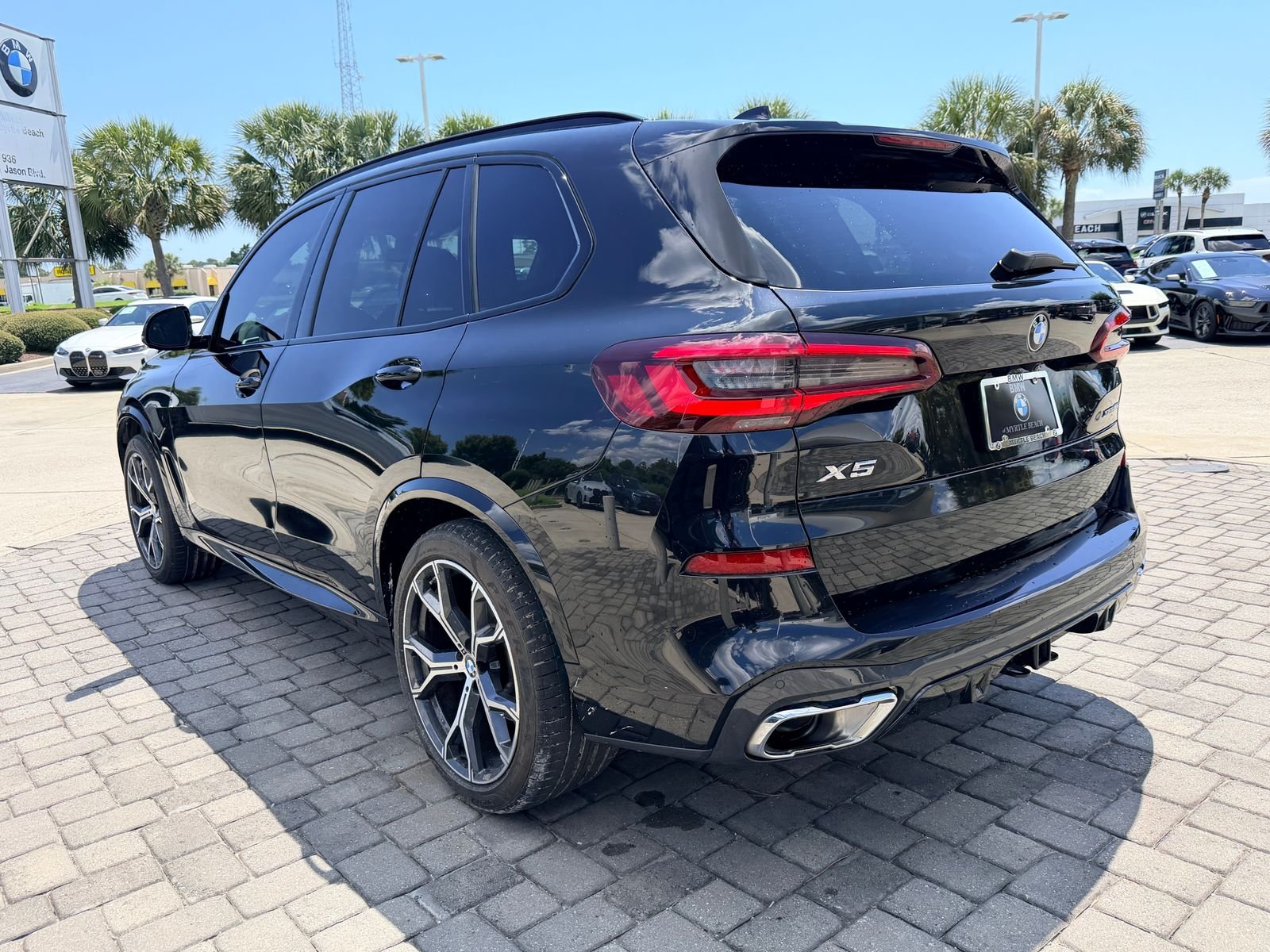 Certified Used 2023 Black Sapphire Metallic BMW xDrive40i image 10