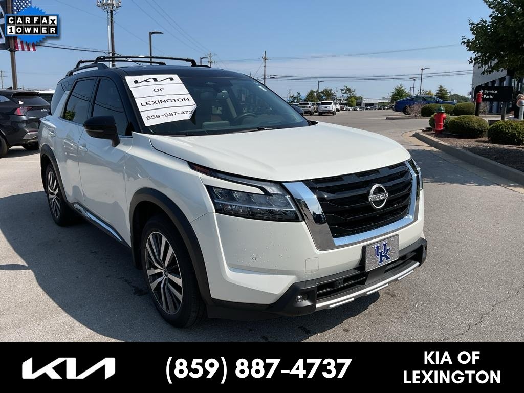 Used 2022 Pearl White Tricoat/Super Black Nissan Platinum image 1