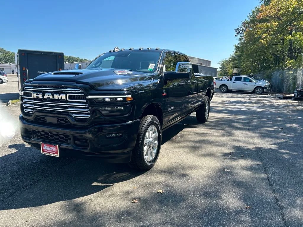 New 2026 Diamond Black Crystal Pearl-Coat Exterior Paint RAM Laramie image 2