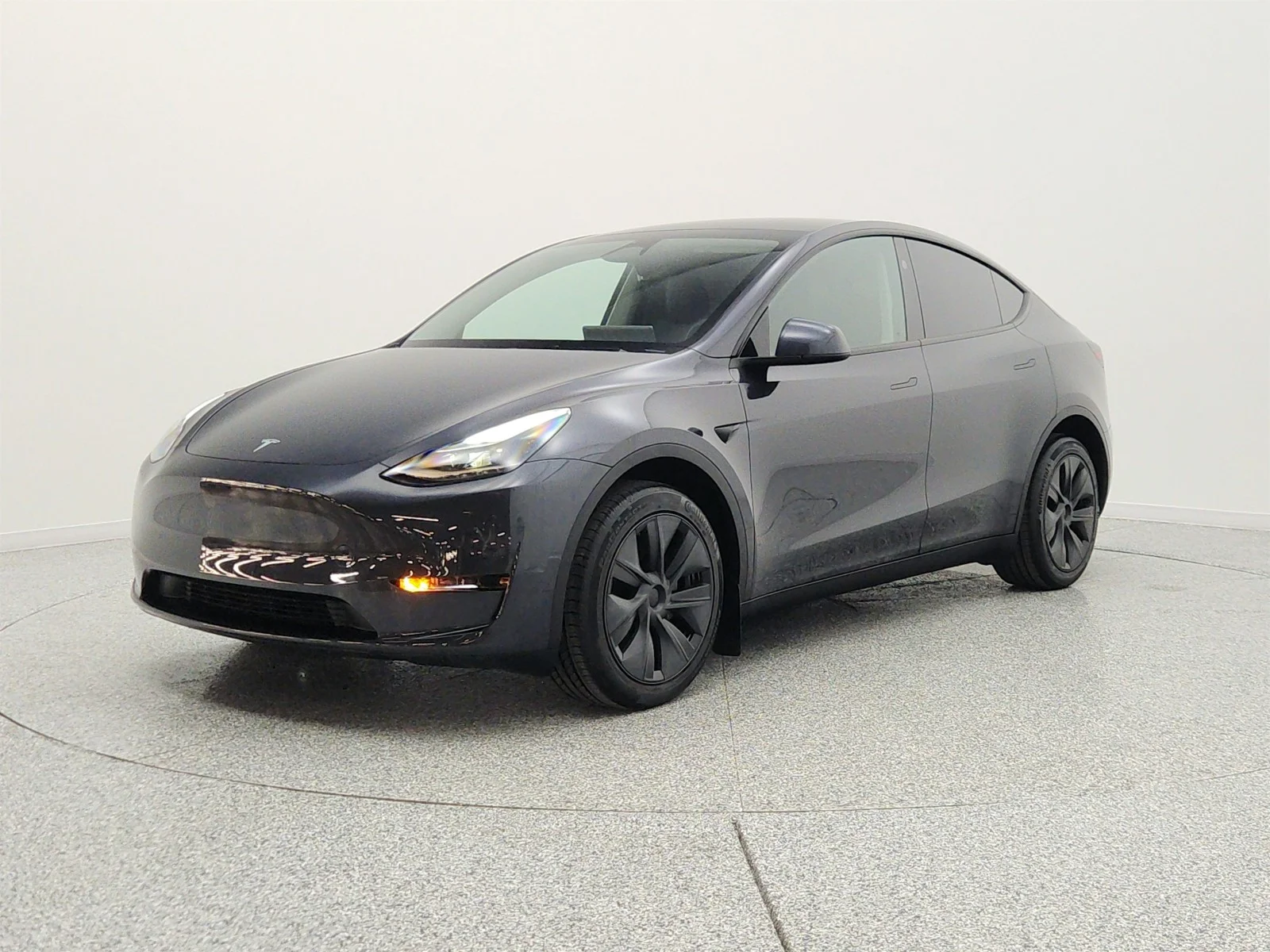 Used 2024 Stealth Grey Tesla Long Range AWD image 1