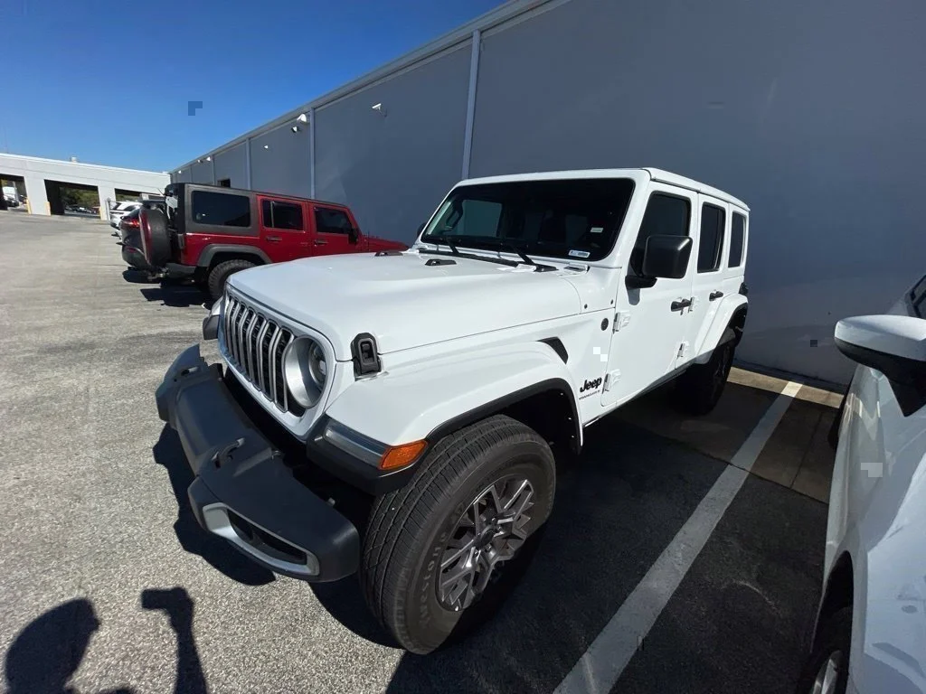 Used 2025 White Jeep Sahara image 1