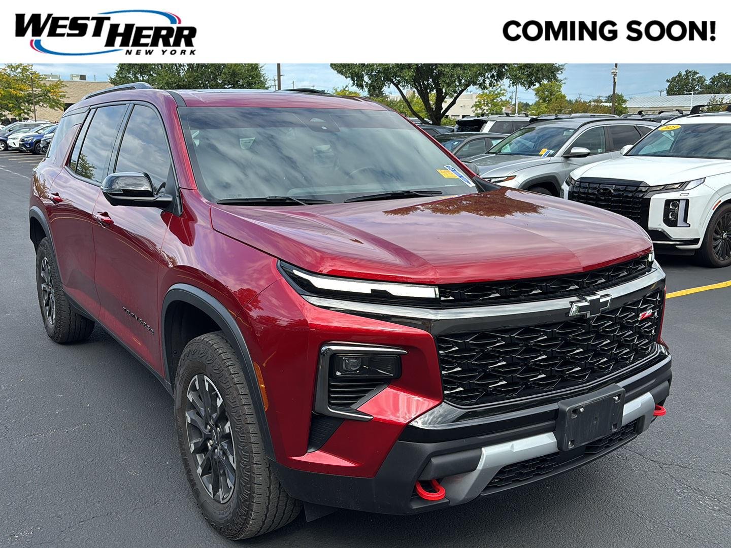 Used 2025 Radiant Red Tintcoat Chevrolet AWD Z71 image 1