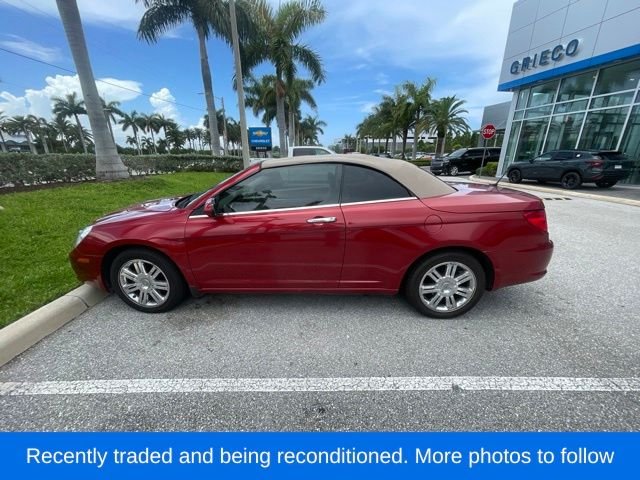 Used 2009 Red Chrysler Limited image 1