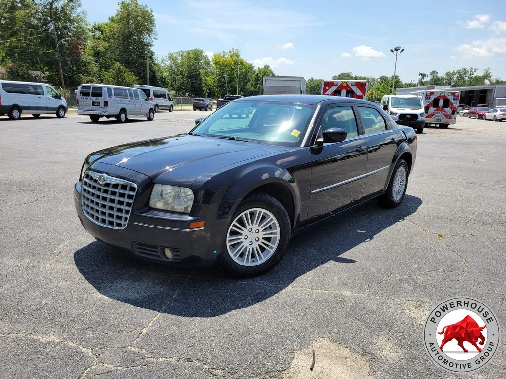 Used 2009 Black Chrysler Touring image 1