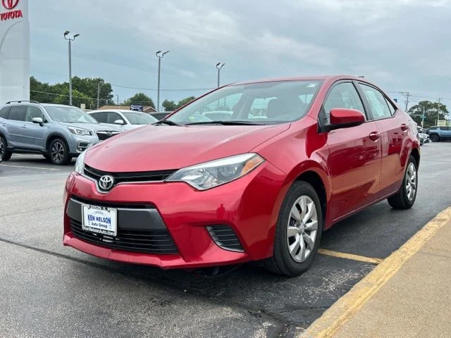 Used 2016 Barcelona Red Metallic Toyota LE image 5