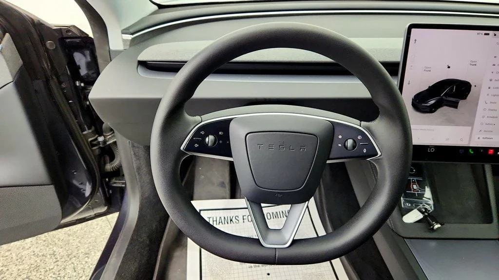 Used 2025 Stealth Grey Tesla Long Range RWD image 13